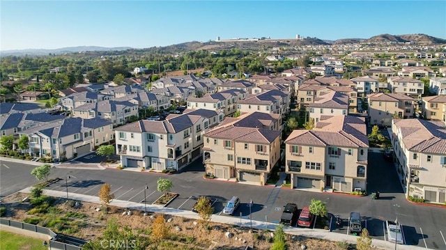 birds eye view of property featuring a mountain view