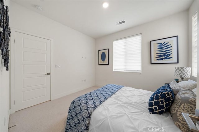 bedroom featuring carpet