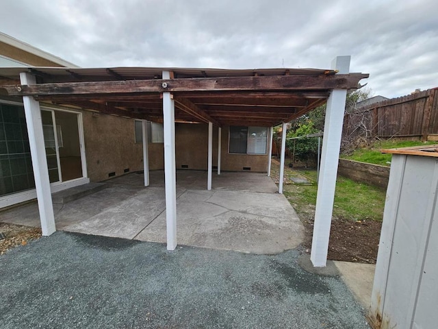 view of patio with a carport