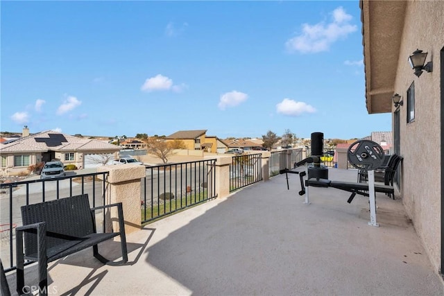 view of patio with a balcony