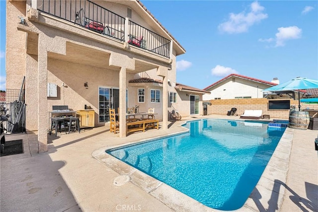 view of pool with a patio area