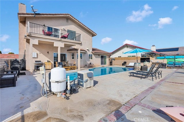 view of pool with a patio