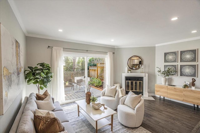 living room with ornamental molding and hardwood / wood-style floors