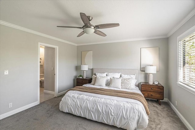 carpeted bedroom featuring ceiling fan, ornamental molding, and ensuite bathroom