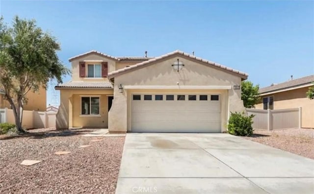 mediterranean / spanish-style home featuring a garage