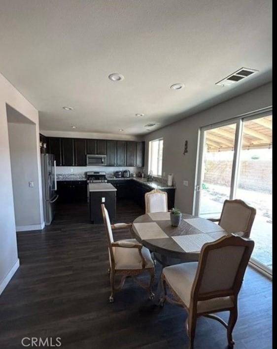 dining room featuring dark hardwood / wood-style floors