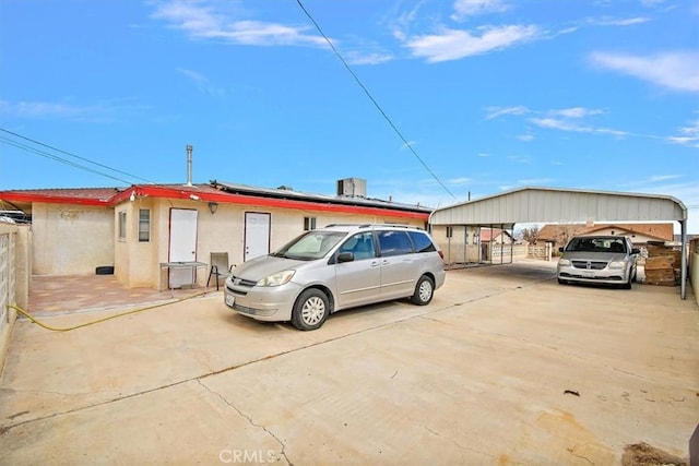 1230 Sunshine Dr, Barstow, CA 92311 - exterior space with a carport