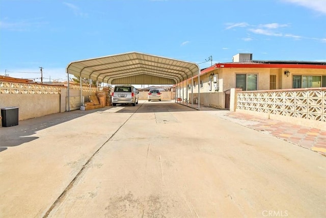 1230 Sunshine Dr, Barstow, CA 92311 - view of car parking featuring a carport