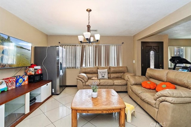 1230 Sunshine Dr, Barstow, CA 92311 - tiled living room with a notable chandelier