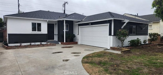 single story home featuring a garage