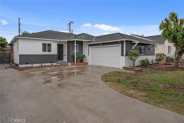 ranch-style home with a garage