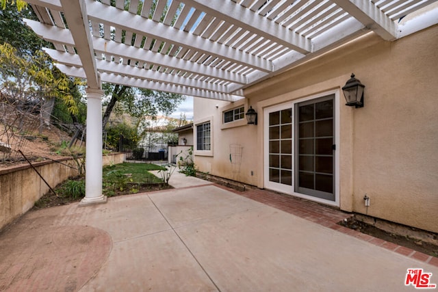 view of patio / terrace featuring a pergola