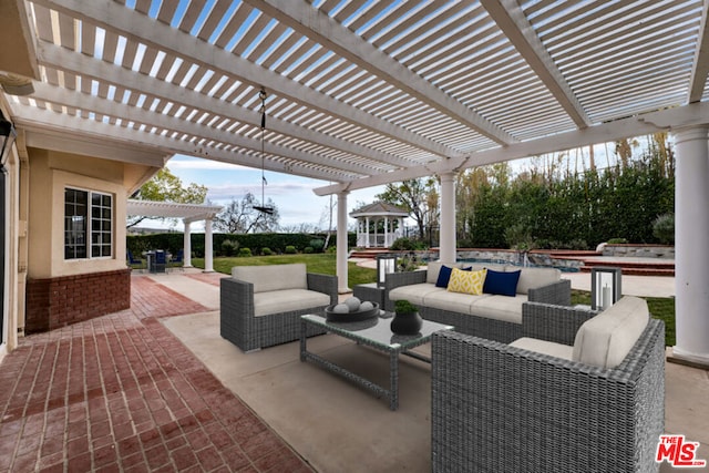 view of patio / terrace with an outdoor hangout area and a pergola