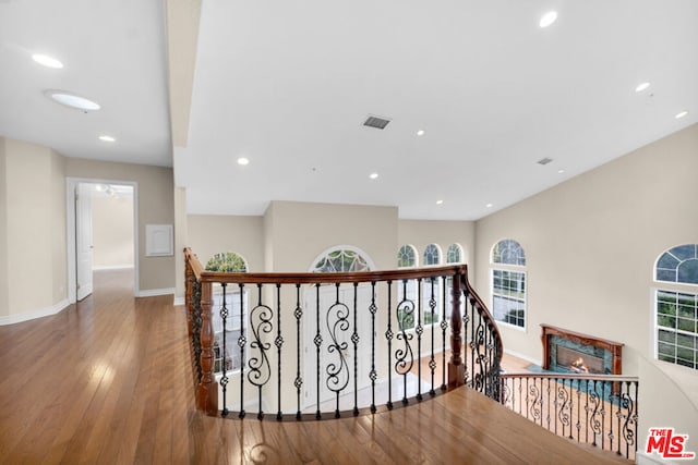 hallway featuring hardwood / wood-style flooring