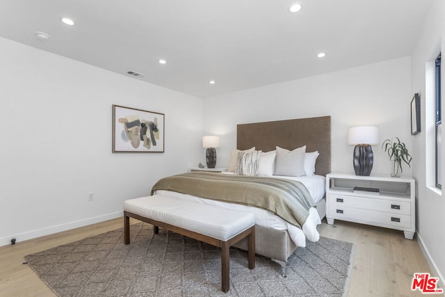 bedroom with light wood-type flooring