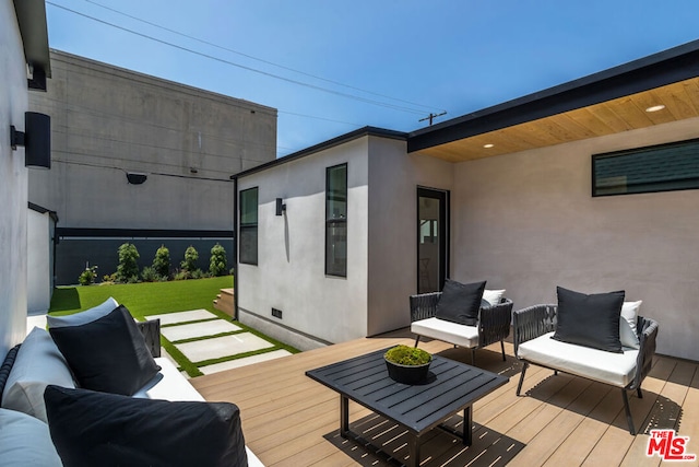 deck featuring an outdoor living space