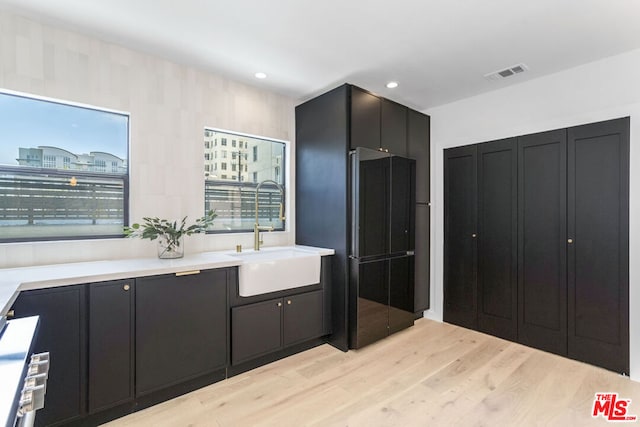 kitchen featuring sink and light hardwood / wood-style floors