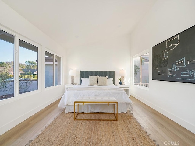 bedroom with light hardwood / wood-style floors