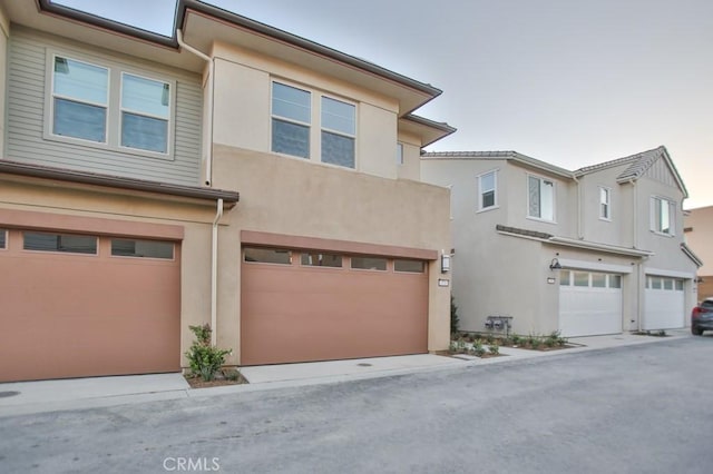 view of property featuring a garage