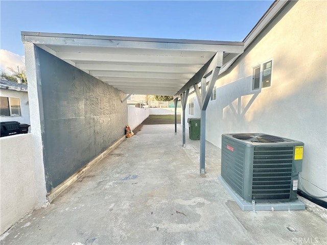 view of vehicle parking with a carport