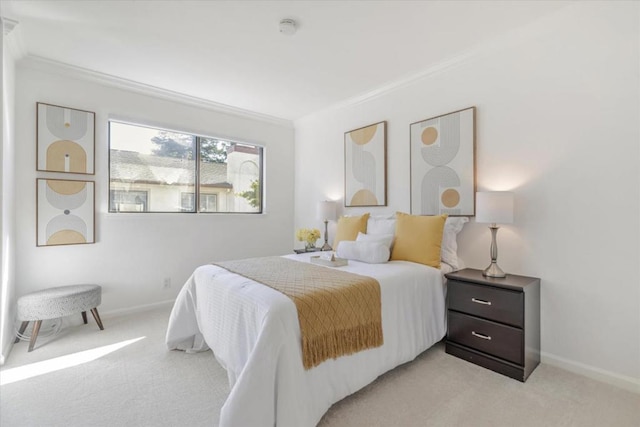 bedroom featuring crown molding and light colored carpet