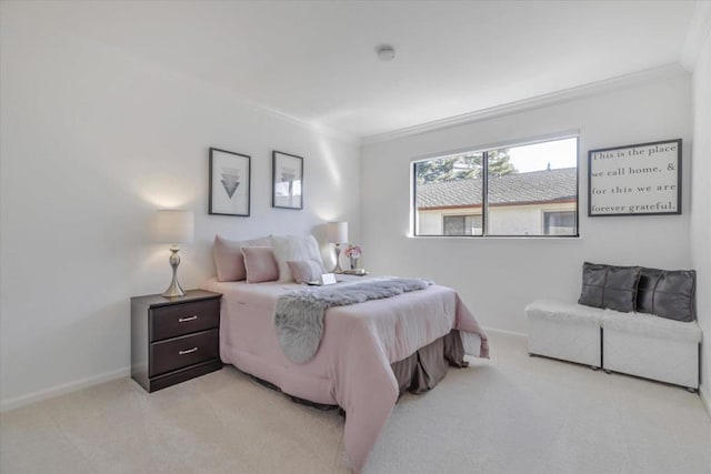 carpeted bedroom with crown molding