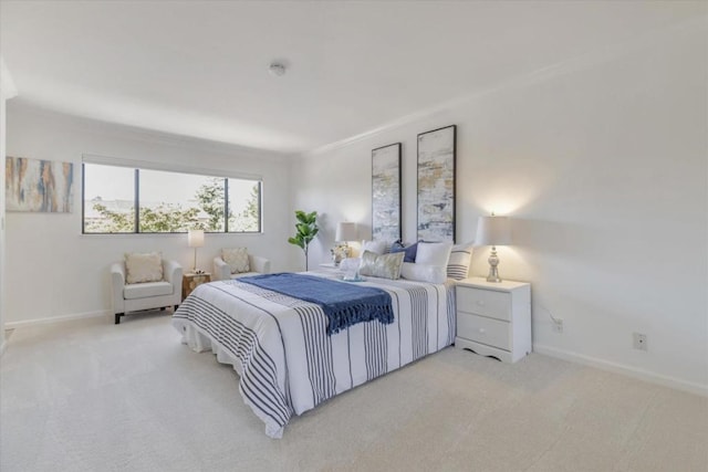 bedroom with light colored carpet