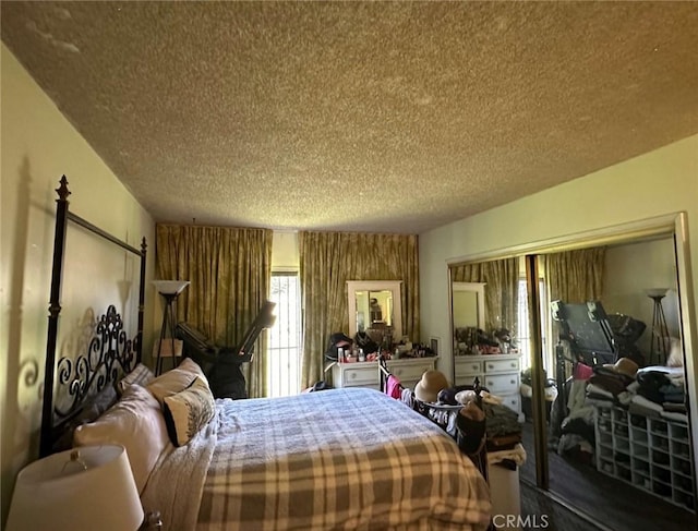 bedroom featuring a textured ceiling