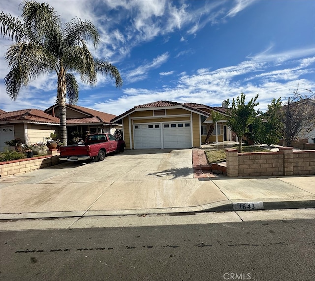 view of front of property with a garage