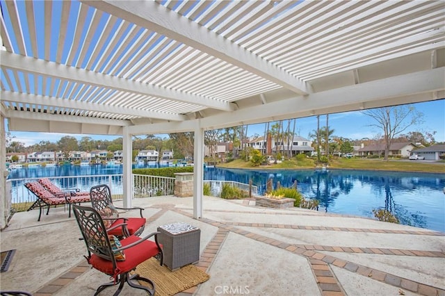 exterior space with a water view, a residential view, an outdoor pool, and a pergola