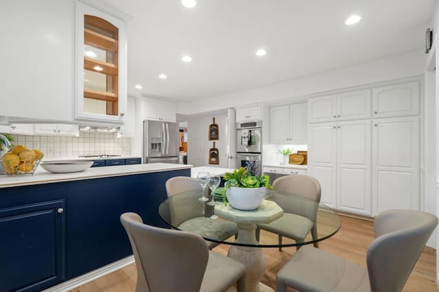 dining room featuring light hardwood / wood-style flooring