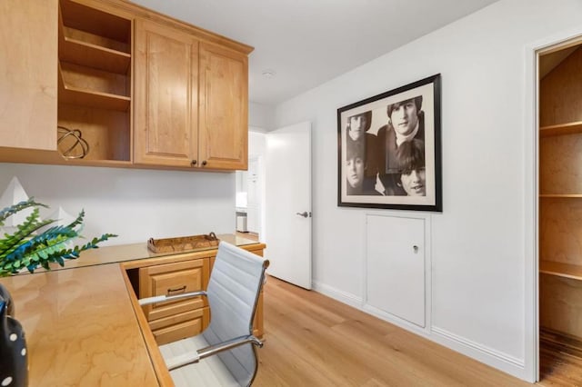 office space with light hardwood / wood-style floors