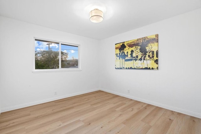 unfurnished room featuring light hardwood / wood-style flooring