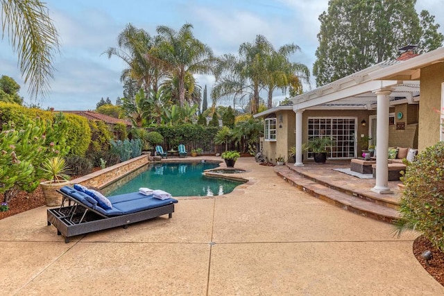 view of pool with a pergola and a patio area