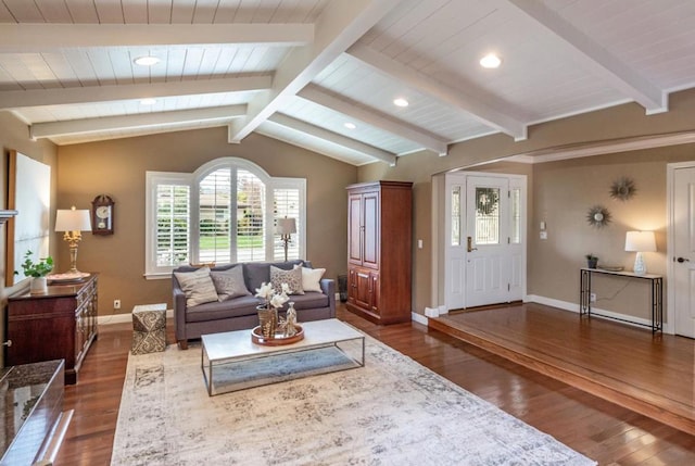 living room with lofted ceiling with beams and dark hardwood / wood-style floors