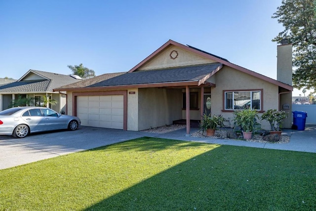 ranch-style home with a garage and a front yard