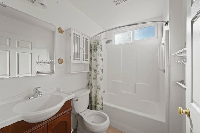 full bathroom with shower / bath combo, vanity, and toilet