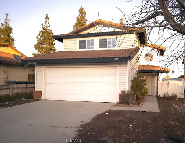 view of front of property featuring a garage