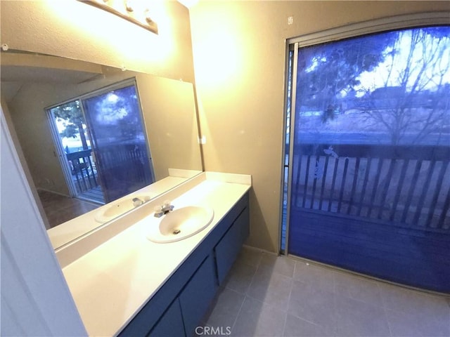 bathroom featuring vanity and tile patterned flooring