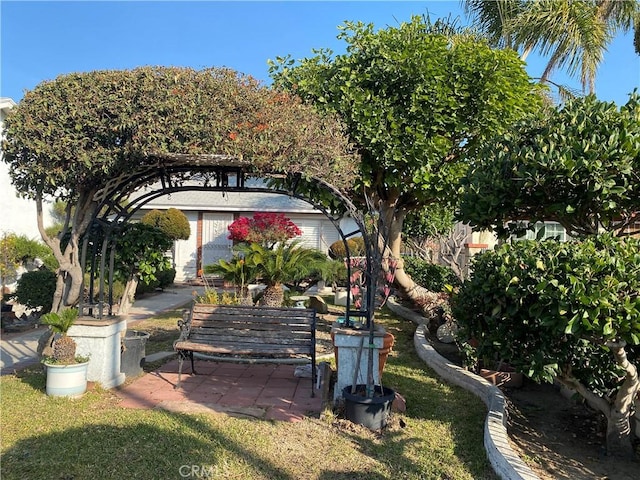 view of home's community with a patio