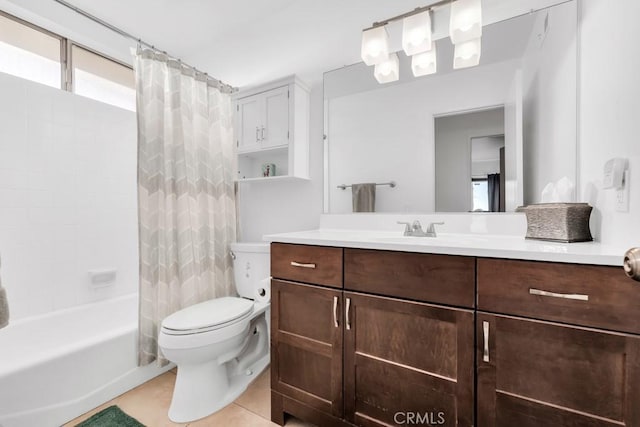 full bathroom with tile patterned flooring, vanity, shower / tub combo with curtain, and toilet