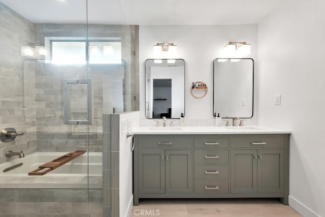 bathroom with independent shower and bath and vanity