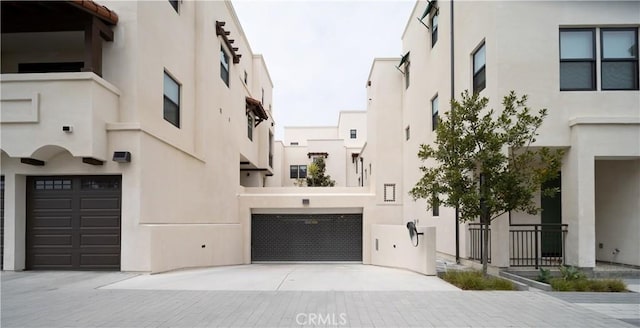 view of building exterior featuring a garage