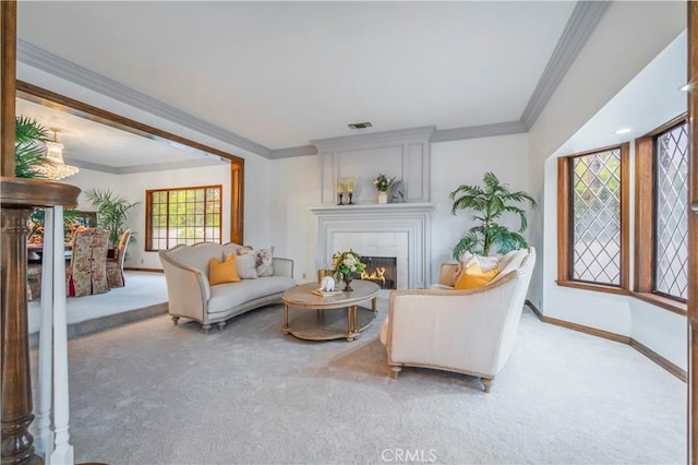 living area with carpet flooring, a fireplace, visible vents, and baseboards