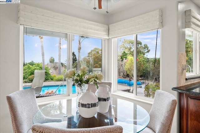 sunroom / solarium featuring a wealth of natural light