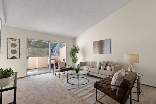 carpeted living room with vaulted ceiling and a textured ceiling