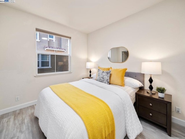 bedroom featuring light hardwood / wood-style flooring