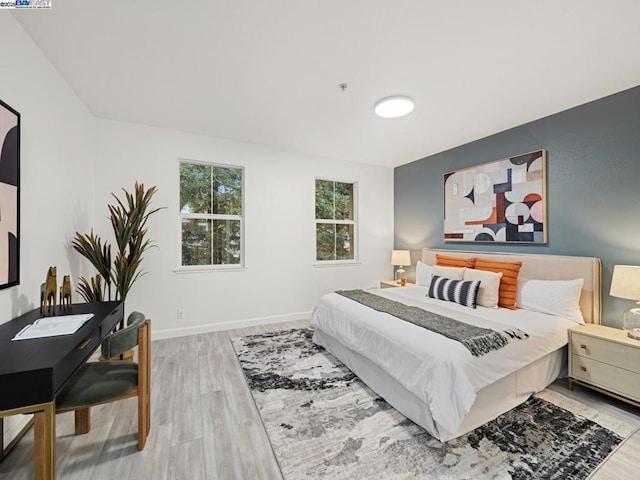 bedroom featuring hardwood / wood-style flooring