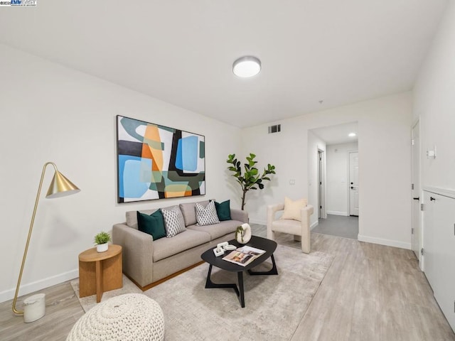 living room with light wood-type flooring