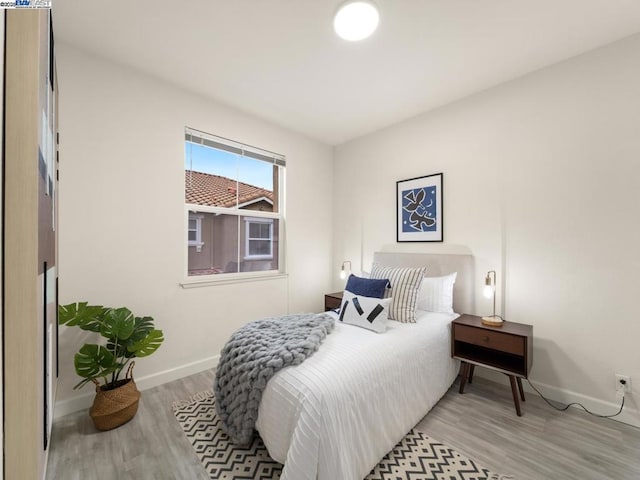 bedroom featuring light hardwood / wood-style floors